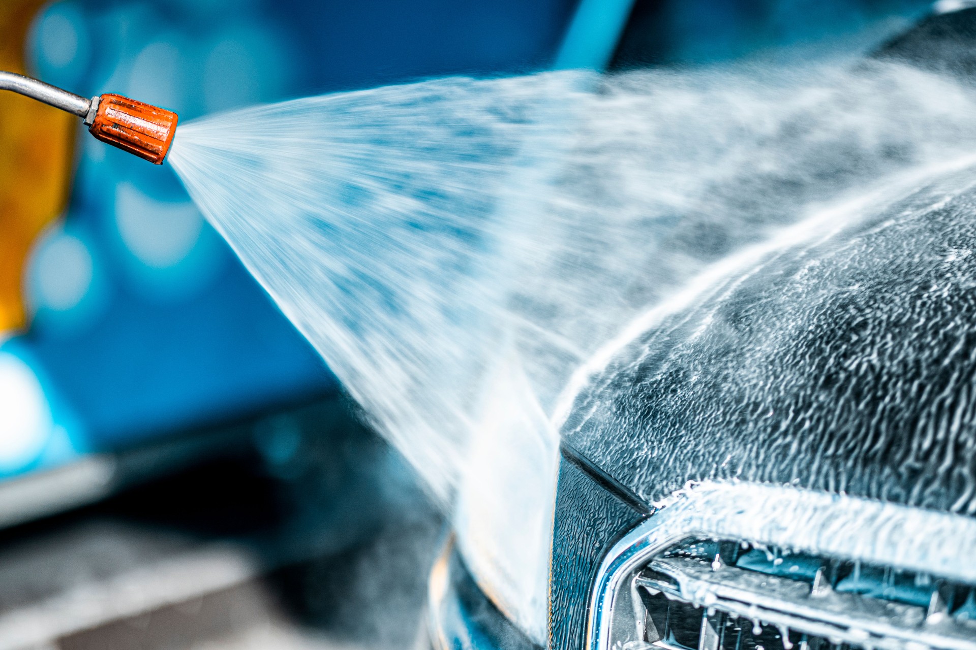 Water under pressure in a self service car wash